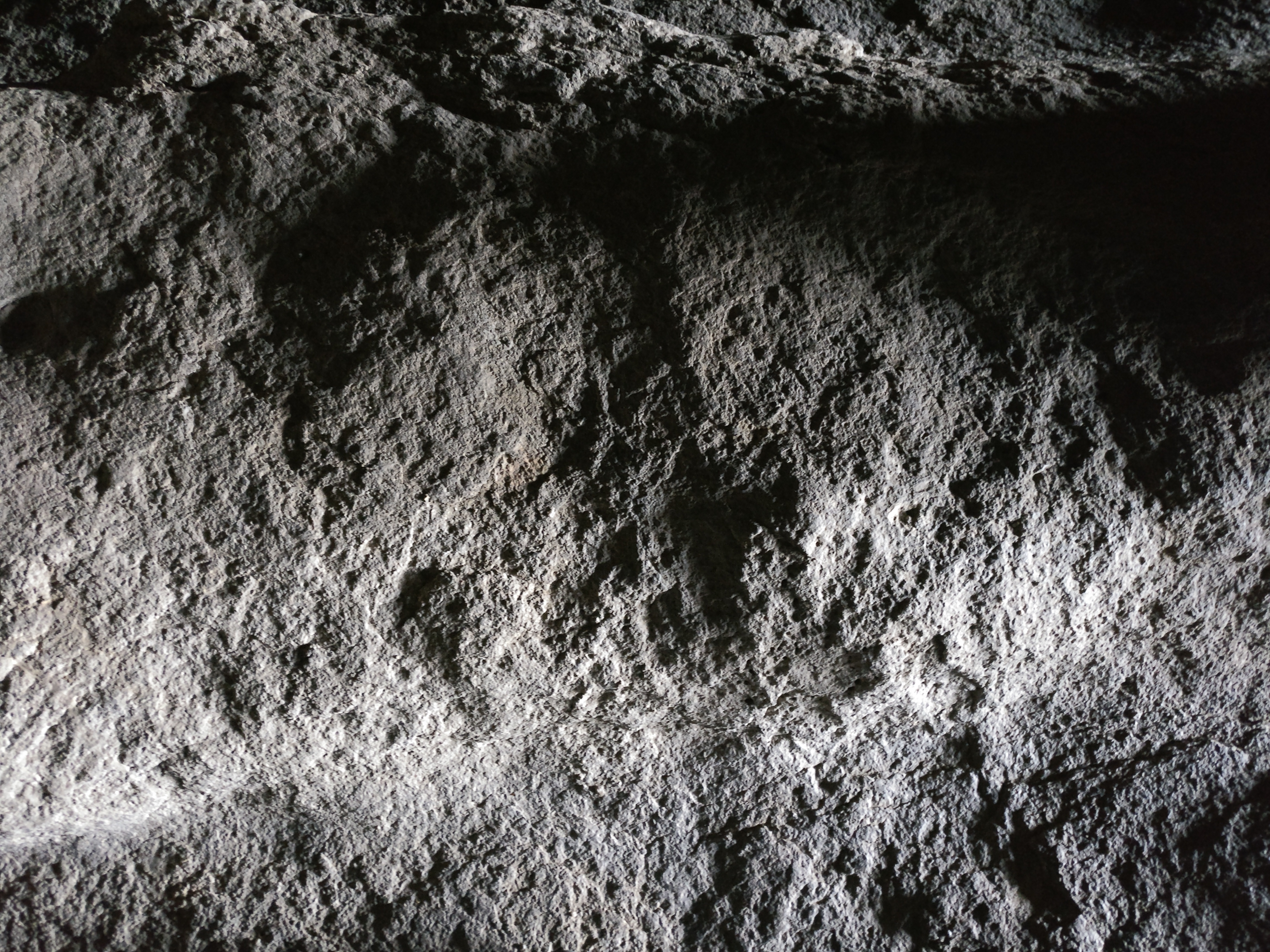 Stone at one of the Buddhist cave carvings at Ellora in Maharashtra